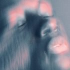 Blurred face with pink and blue gradient effect. Suitable for graphic design projects and Photoshop effects. Ideal for art and tech mockups.