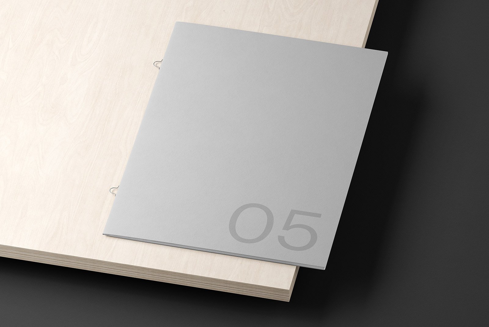 Magazine print mockup on a wooden surface suitable for graphic designers. Perfect for print mockup category. High-quality PSD file for design presentations.