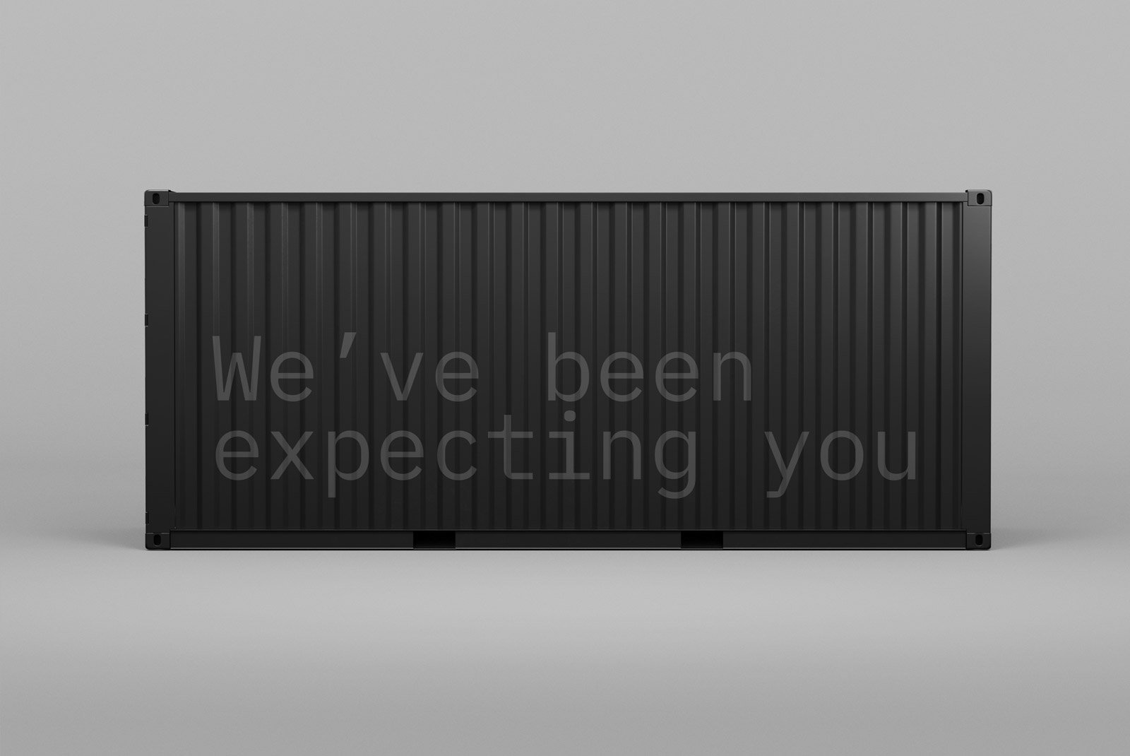 Black shipping container mockup with text We've been expecting you Marketing graphic design Packaging mockups Template for graphic designers SEO Alt text
