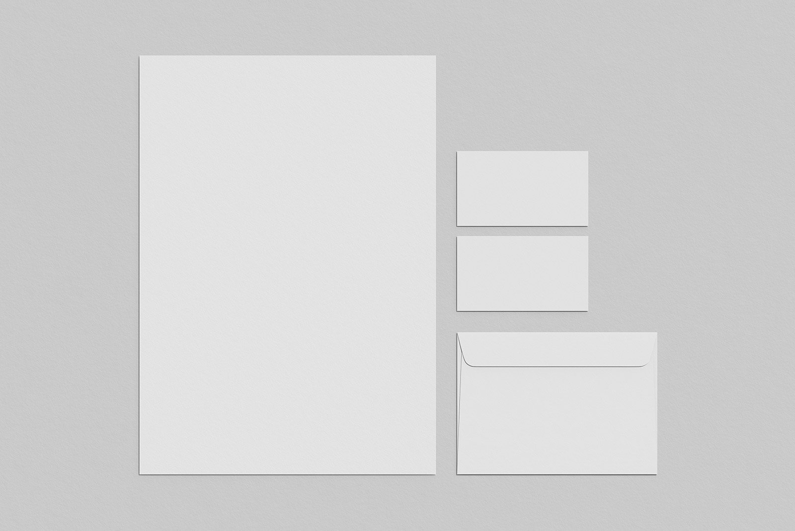Stationery mockup for designers includes a blank letterhead envelope and business cards. Ideal for print mockups branding presentations and corporate identity designs.