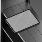 Tablet on a black stand for tech mockups featuring sleek design perfect for graphic designers ideal for presenting digital assets efficiently