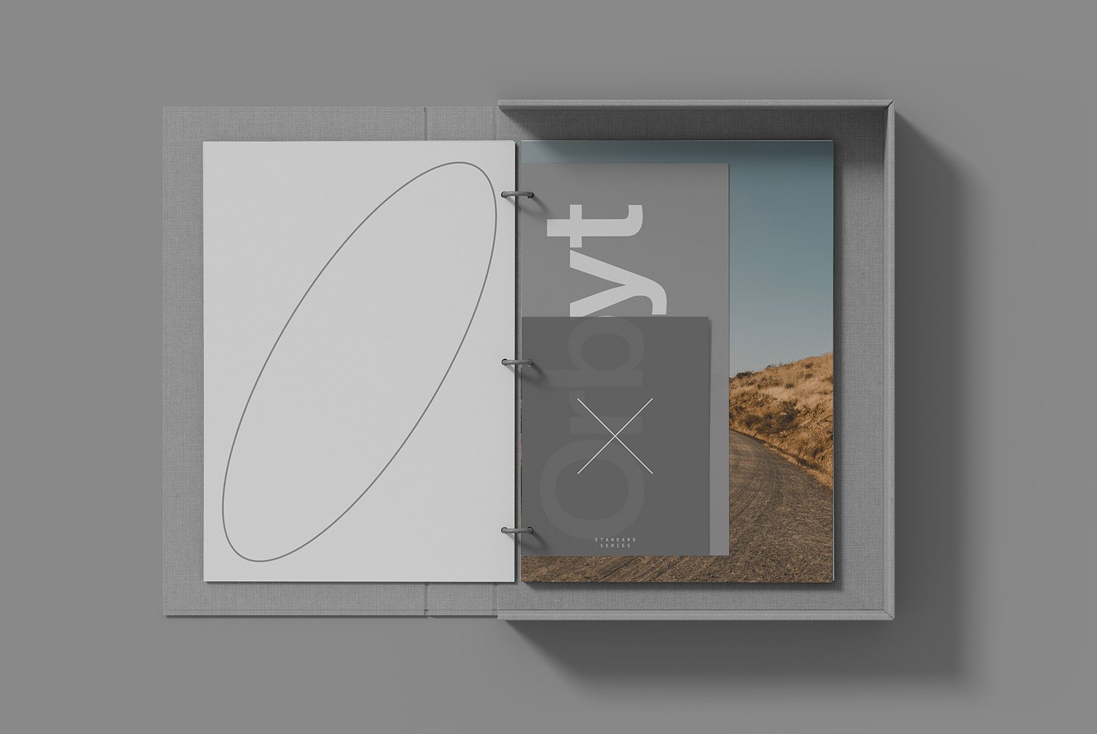 Binder print mockup top view featuring minimalistic designs and landscape photography; perfect for graphic designers showcasing print designs.