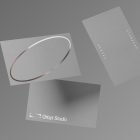 Minimalist business card mockups floating against a gray background perfect for graphic designers seeking elegant print mockup templates and graphic resources.