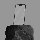 Smartphone mockup on a rock pedestal with gray background. Ideal for tech mockups digital asset store graphic designers showcasing phone screens and apps.