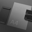 Dark-themed print mockup featuring an envelope, A4 paper, and two business cards with numbers. Ideal for graphic designers for previewing print designs.