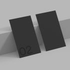 Minimalist black business cards mockup showcasing front and back designs. Perfect for print mockups, branding, and graphic design presentations.
