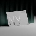 Business card mockup with silver foil text placed against a dark green, vertical pleated background in a minimal studio setup for print mockup designs.