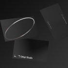 Floating black business cards mockup against a dark background perfect for showcasing print designs to graphic designers in need of professional mockups.
