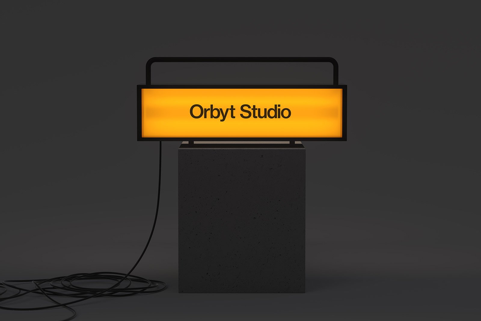Illuminated yellow sign mockup with Orbyt Studio text on black pedestal. Perfect for billboard mockup, graphic design, marketing presentations, digital assets.