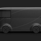 Modern tech vehicle mockup displayed in profile against a dark background; sleek black design, futuristic aesthetic; ideal for graphic designers, tech mockups.
