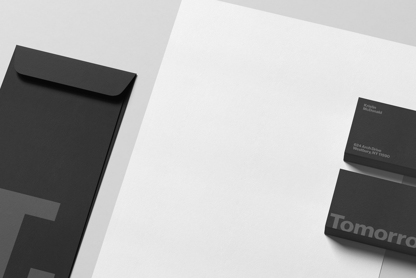Black business card mockup with an envelope on a white background suitable for graphic designers Print mockup professional branding stationery template
