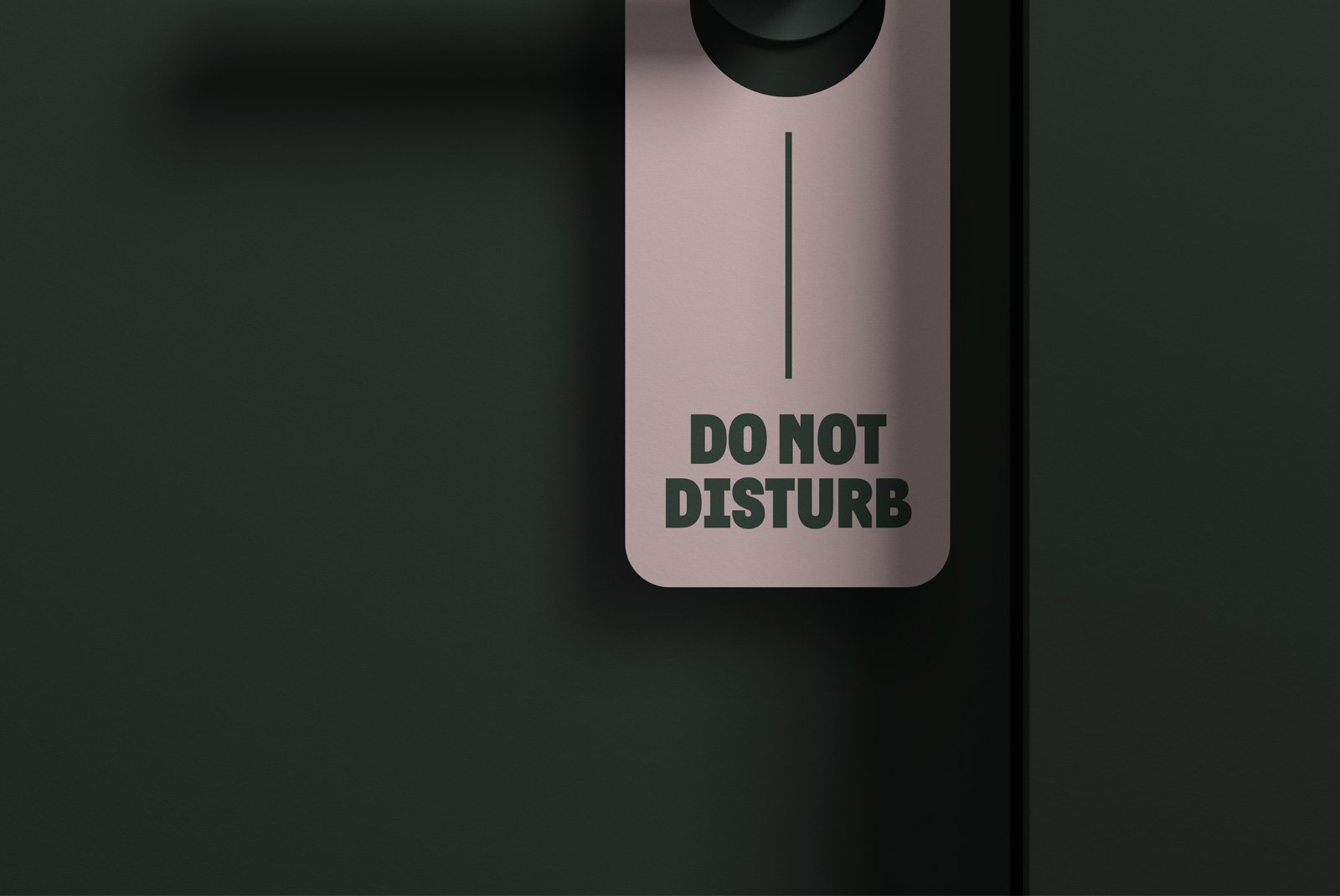 Do not disturb door hanger mockup on a black background ideal for graphic designers creating print mockups door tags and signage designs for hotels and offices.