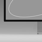 Close-up of a tech mockup showing part of a modern monitor with a gray screen on a light gray background, ideal for graphic designers and digital projects.