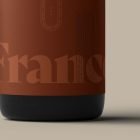 Close-up of a red wine bottle label design mockup with elegant typography suitable for packaging. Ideal for graphic designers and packaging mockup resources.