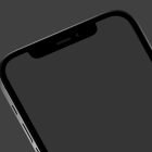 Closeup of smartphone screen and top edge; tech mockup for designers; high-quality digital asset showcasing mobile device design with a dark theme background.