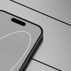 Close-up of a modern smartphone screen with a minimalistic design on a sleek surface. Ideal for tech mockups, website and app interface design projects.