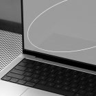 Laptop with black keyboard and screen on perforated metal surface. Ideal tech mockup for graphic designers. High-resolution asset for digital design projects.