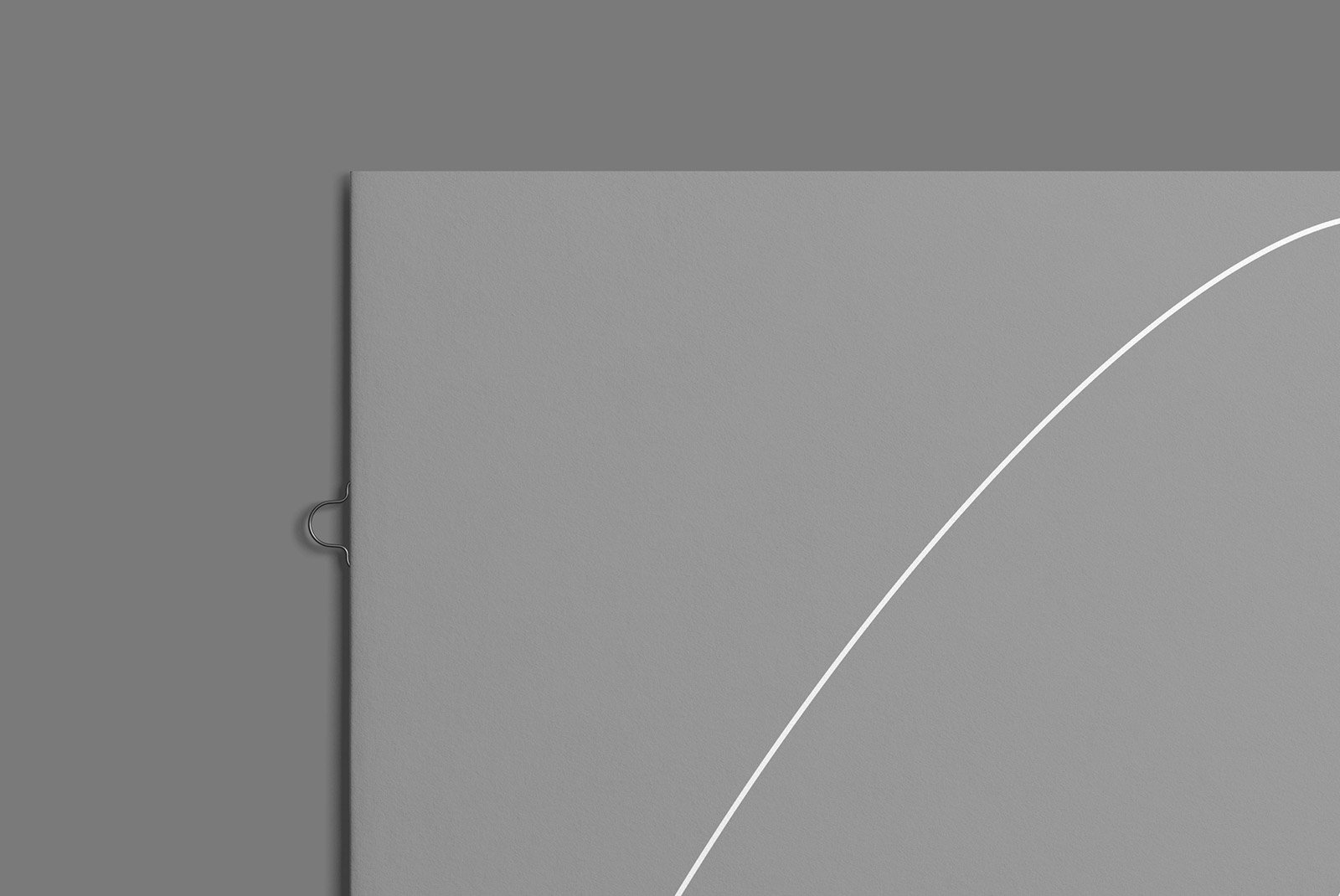 Gray brochure mockup with a minimalist design and a white arc line on the cover. Ideal for print mockups and graphic designers seeking modern presentation templates.