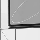 Close-up of a tablet placed on a minimal metallic surface with a gray display featuring a simple white line. Ideal for tech mockups and product presentations.