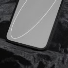 Close-up of a smartphone with case on a textured rock surface used in tech mockups for graphic designers showcasing digital products or mobile app interfaces.