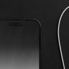 Black smartphone tech mockup and white USB cable on dark surface realistic mockup template for graphic designers digital assets store print tech packaging apparel