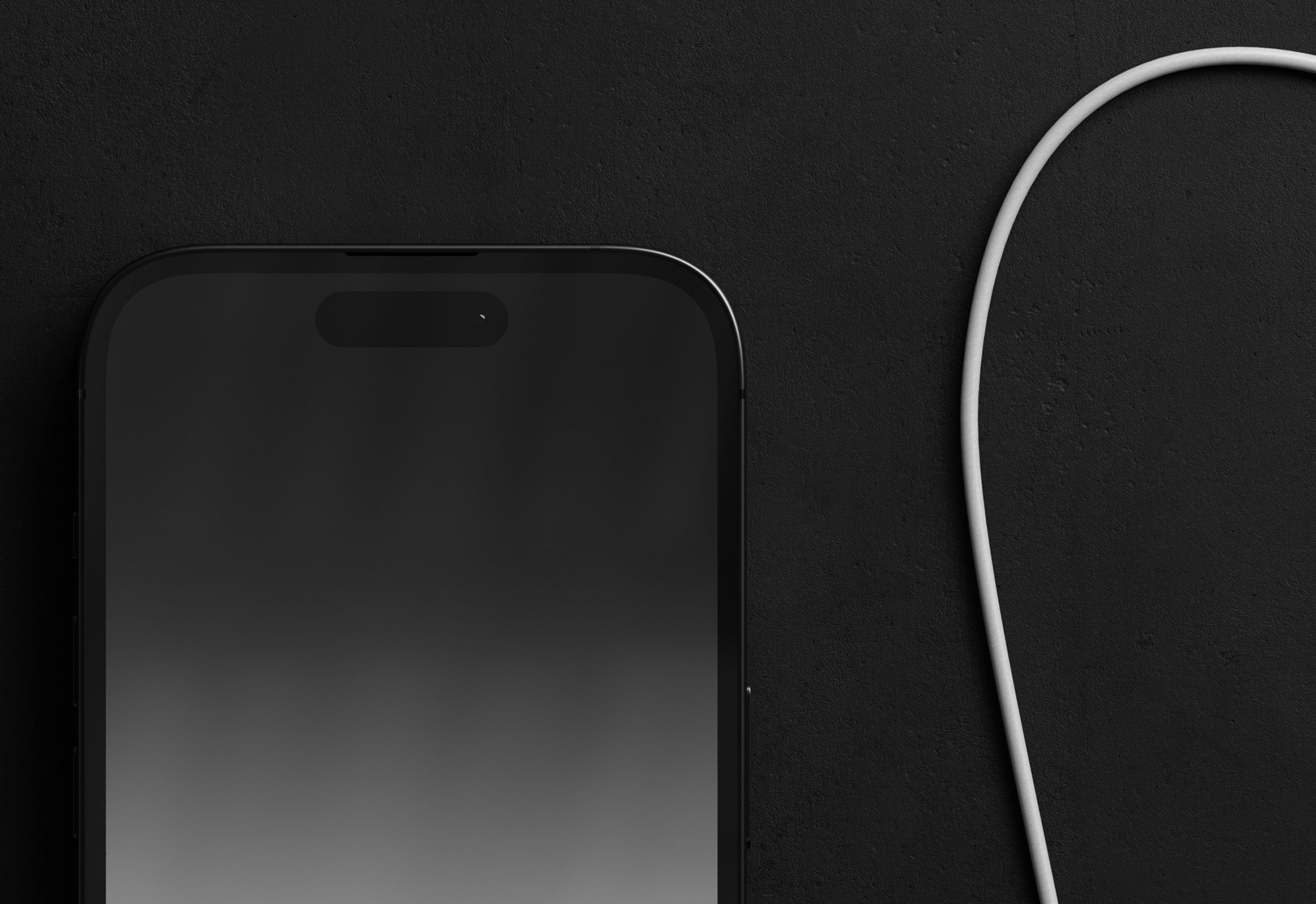 Black smartphone tech mockup and white USB cable on dark surface realistic mockup template for graphic designers digital assets store print tech packaging apparel