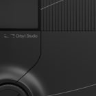 Close-up of black tech mockup with Orbyt Studio logo suitable for graphic designers looking for high-quality digital assets for presentations and marketing.