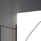 Partial view of a vertical billboard mockup with a modern design, set against a textured concrete wall background. Ideal for graphic designers.