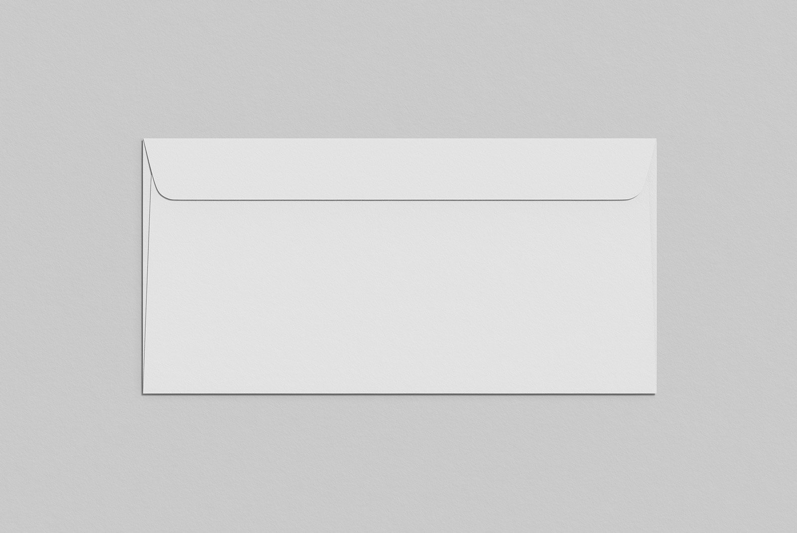 White envelope mockup on gray background. Ideal for print mockups, stationery design, branding projects, and graphic designers looking for editable templates.