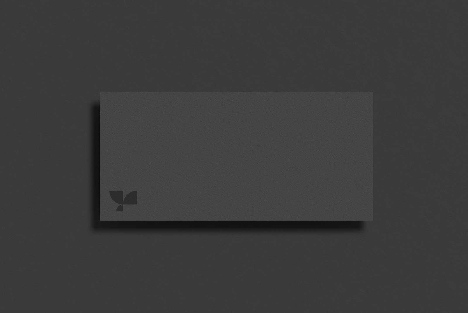 Dark business card mockup isolated on a textured background perfect for print design presentations branding projects and showcasing graphic design work