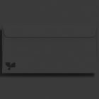 Black envelope mockup on a dark background suitable for graphic designers looking for minimalistic print mockup resources for branding and stationery designs.