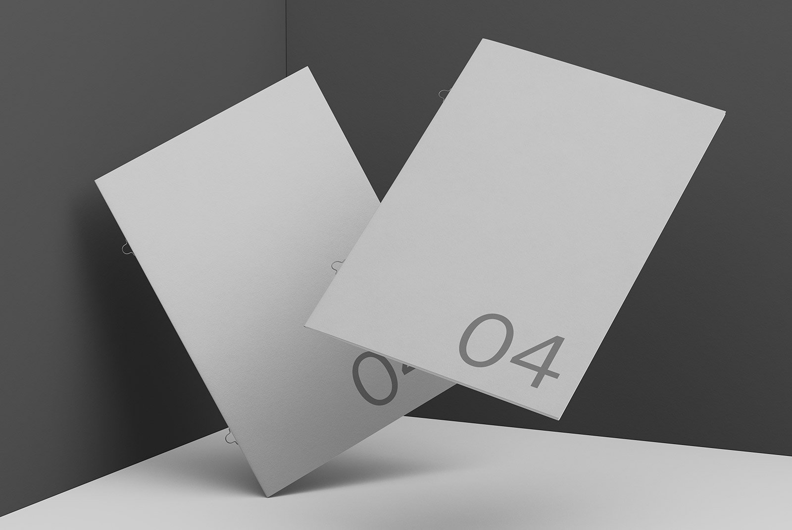 Minimalist A4 print mockup with two blank sheets angled against dark backdrop suitable for graphic designers showcasing minimalist print designs and templates.