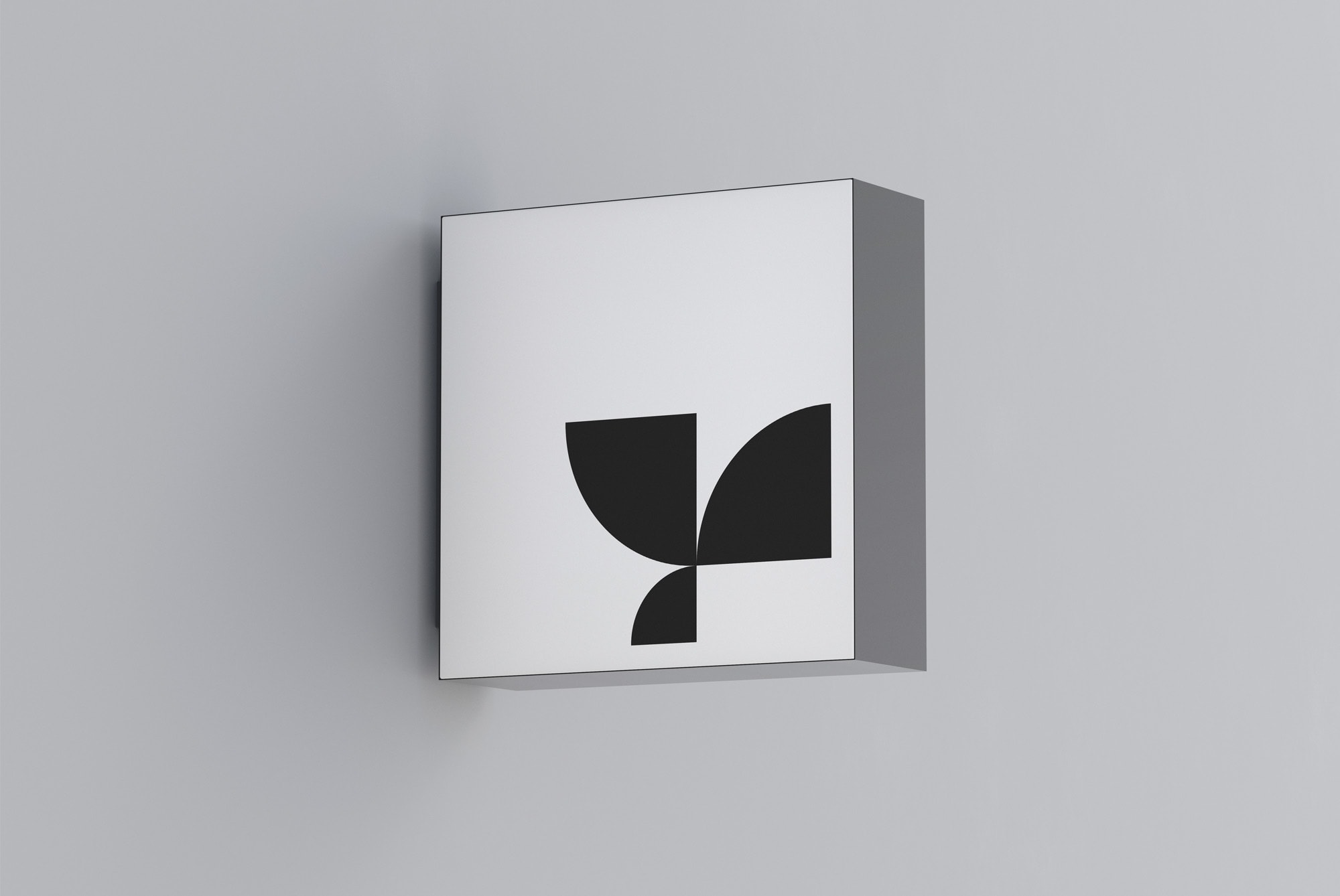 Minimalist wall sign mockup featuring a black geometric logo on a white background. Ideal for branding designers showcasing print or billboard mockups.