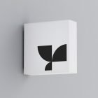 Square signage board mockup with geometric black logo design fixed on a grey wall perfect for graphic designers print mockups branding presentations marketing