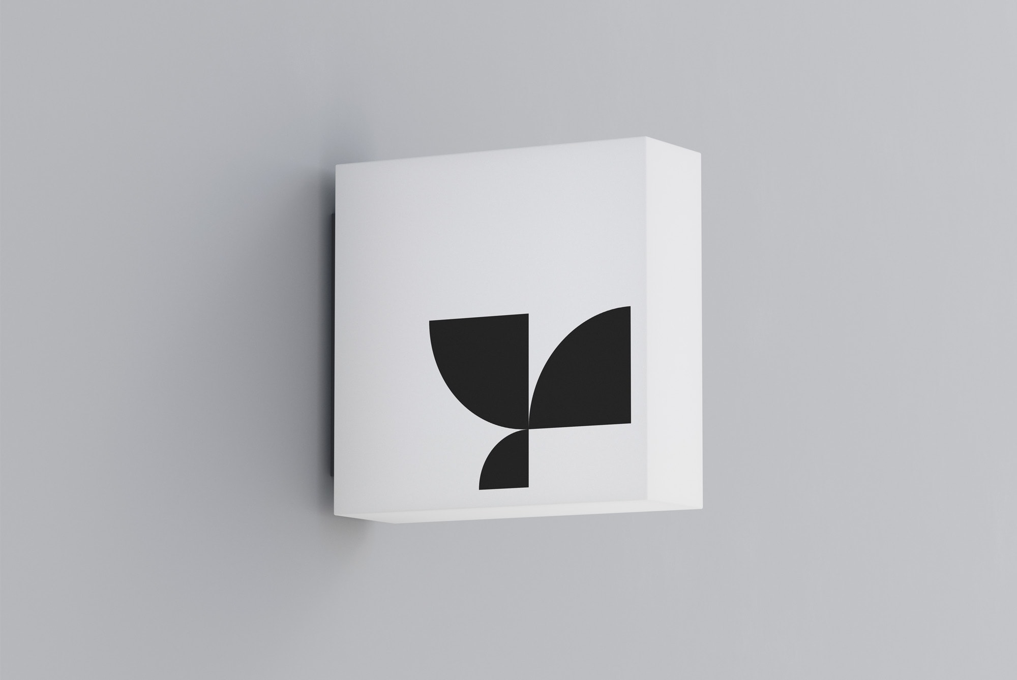 Square signage board mockup with geometric black logo design fixed on a grey wall perfect for graphic designers print mockups branding presentations marketing