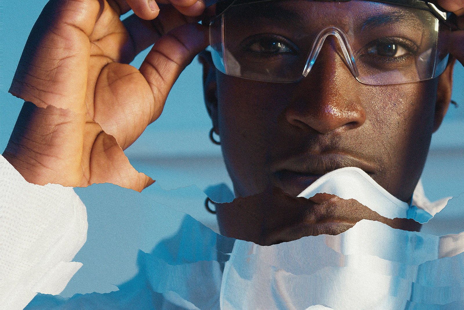Close-up of a person wearing goggles with torn paper collage effect. Suitable for Photoshop effects category. Keywords: Photoshop, collage, close-up, graphics.