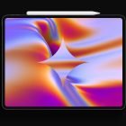 Digital tech mockup featuring a tablet with colorful abstract gradient graphics and a stylus on black background ideal for graphic designers SEO assets