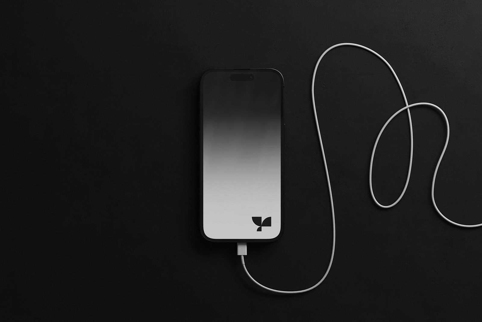 Smartphone with charging cable on black background, ideal for tech mockups, digital devices, minimalist design templates, graphic design resources.
