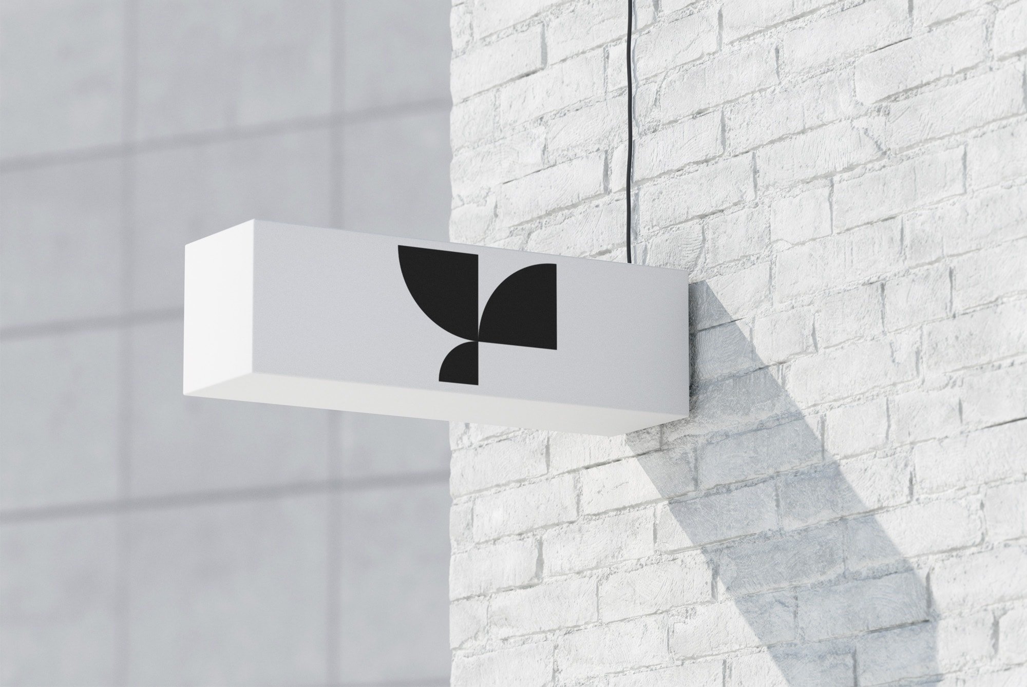 Modern rectangular billboard mockup on a brick wall for signage designs, perfect for graphic designers showcasing branding, advertising, and logo projects.