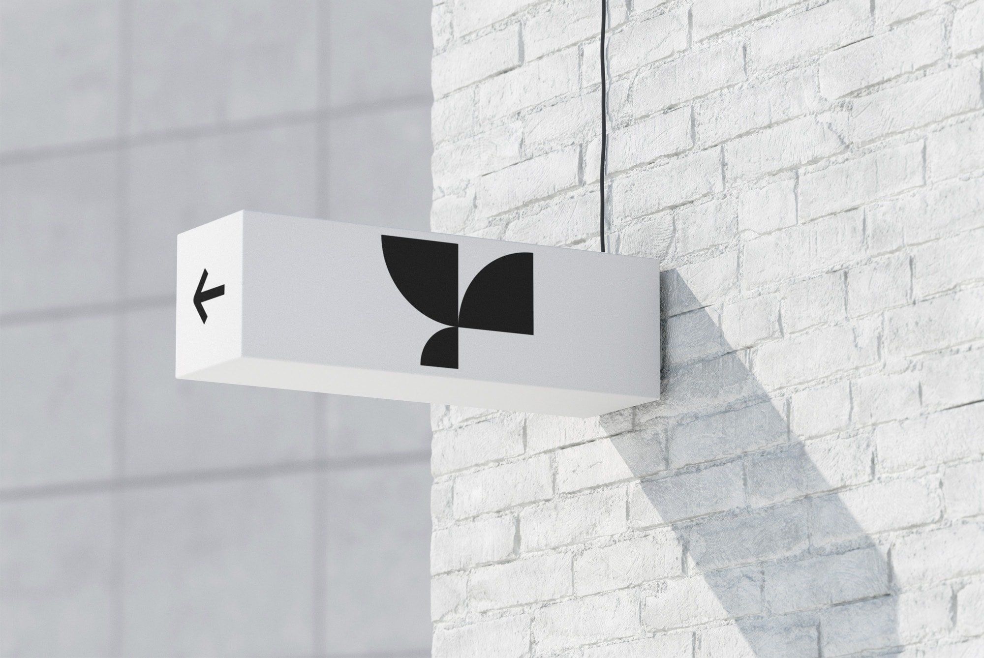 Outdoor signage mockup on a white brick wall with modern design and arrow, ideal for graphic designers seeking billboard and billboard mockups for branding visuals.