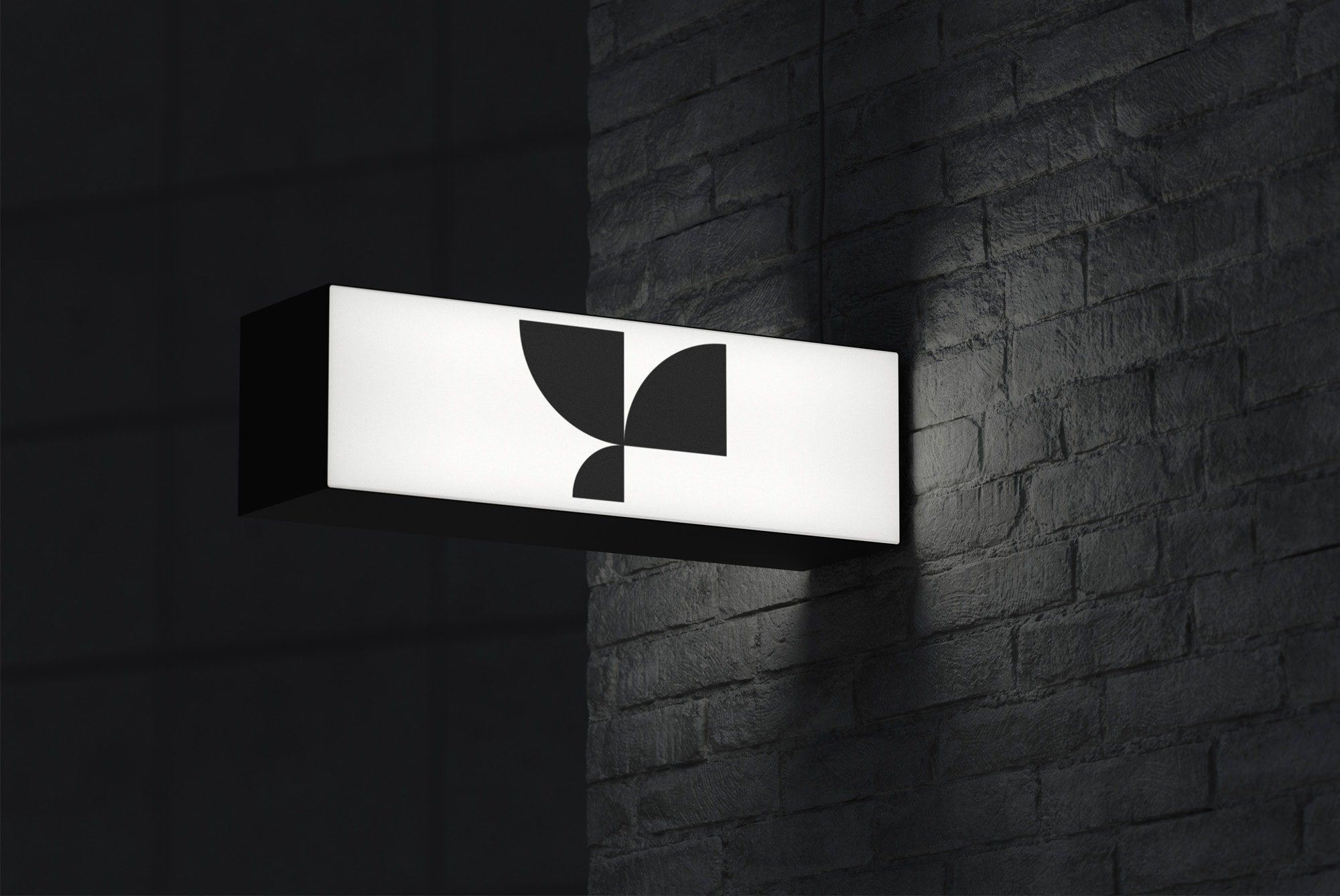 Rectangular billboard mockup on a brick wall with a geometric black logo suitable for graphic designers showcasing outdoor signage branding.