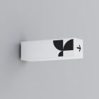 Wall-mounted lightbox signage mockup with minimalist graphic design featuring a black arrow and geometric shapes for graphic designers in the billboard mockups category.