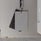 Top view of a modern ID card mockup with a lanyard on a grey textured surface ideal for graphic designers and print mockup projects.
