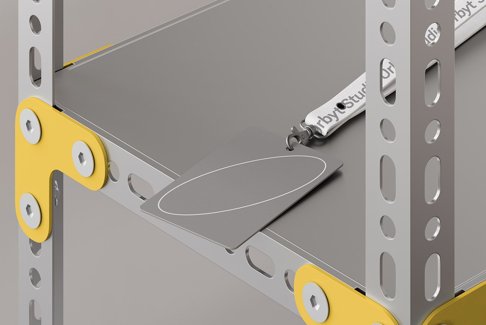 Lanyard with blank ID card mockup hanging on a metallic industrial-style frame with yellow accents ideal for print mockups and graphic design templates.