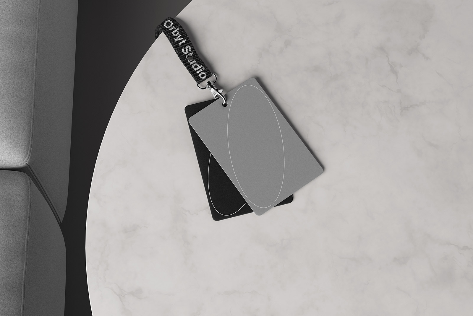 Apparel mockup showing blank lanyard with two ID cards on a marble surface. Ideal for graphic designers seeking realistic ID card designs.