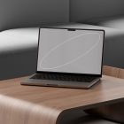 Laptop on wooden table mockup, grey couch background, tech mockups, digital assets for graphic designers, realistic display mockup, minimal design.