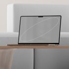 Tech mockup featuring a modern laptop on a stylish wooden table in front of a gray sofa perfect for digital assets and graphic designers.