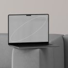 Modern laptop tech mockup on a gray couch minimalist design ideal for graphic designers digital assets product mockups showcase clean user interface