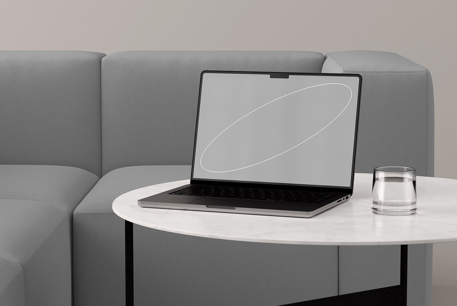 Modern tech mockup showing a laptop on a marble table with a glass of water, situated in a minimalist living space with a grey sofa background.