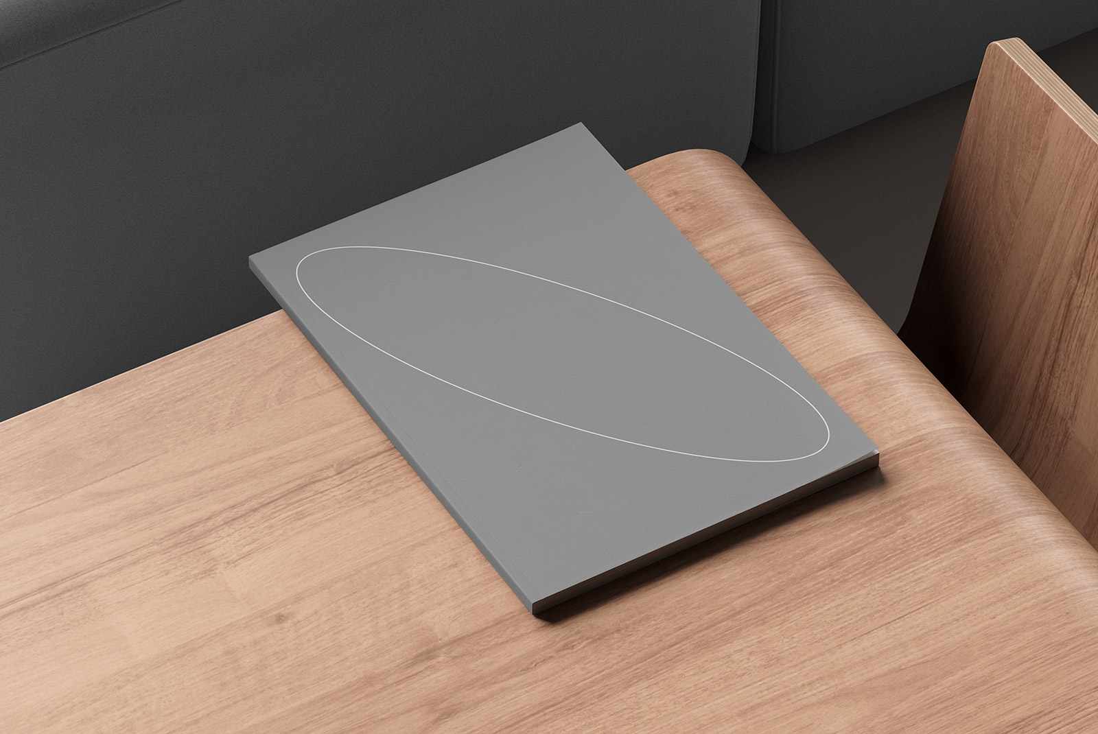 Gray book cover mockup placed on a wooden table environment appealing for graphic designers includes print mockups packaging mockups SEO keywords